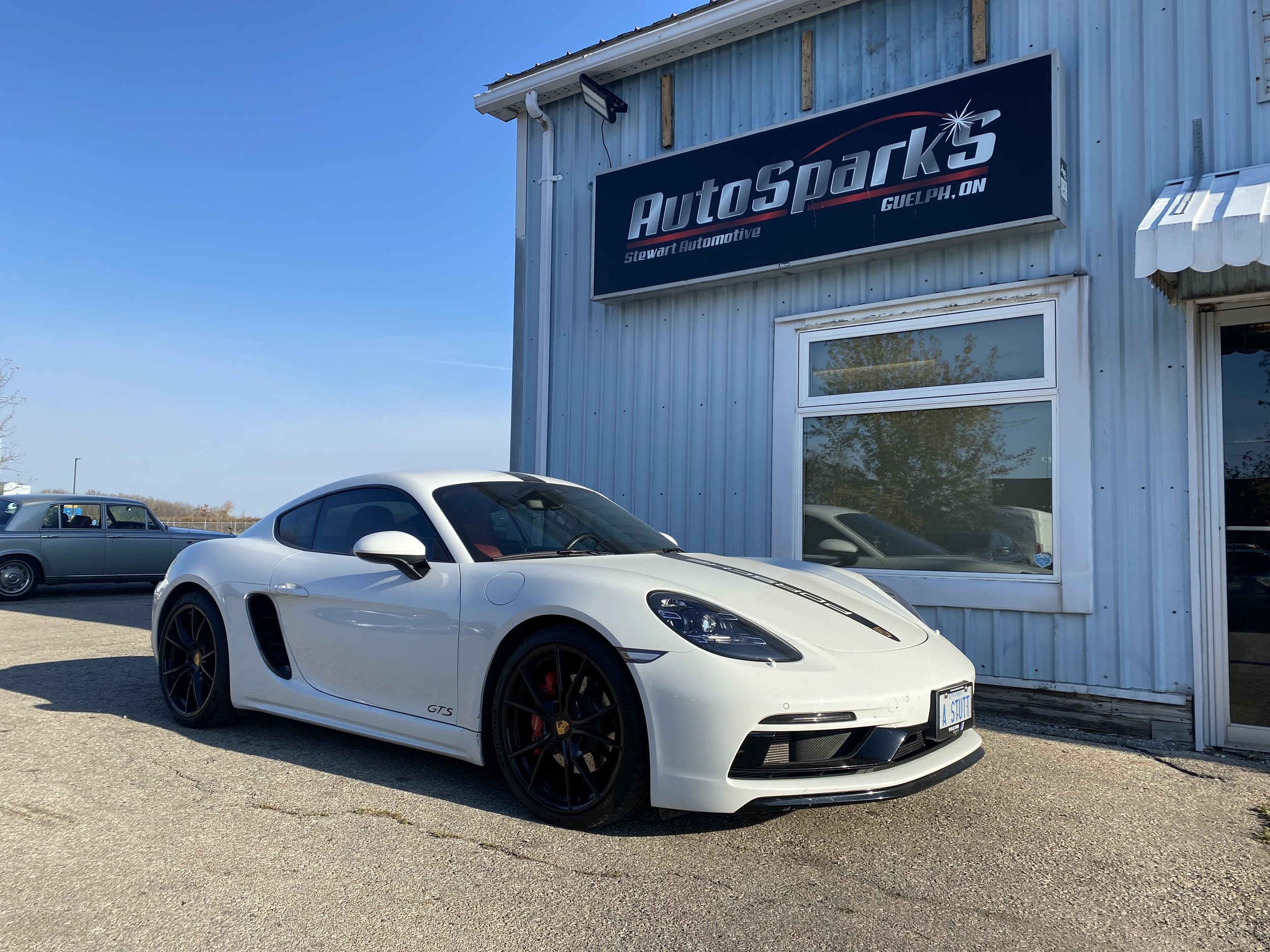 Porsche 718 Cayman GTS outside the shop — best exterior shot